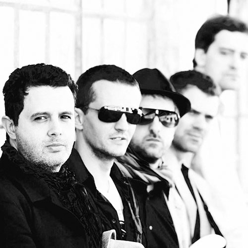 Members of the band Casual Attraction looking at the camera in a posed shot.
